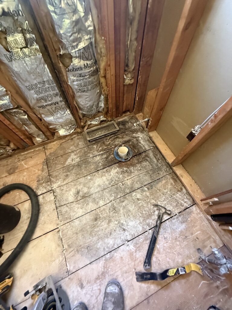 Water-damaged bathroom subfloor repair in Evansville IN