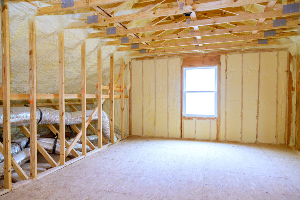 Energy-efficient spray foam insulation and framing in a new home under construction in Evansville, Indiana.